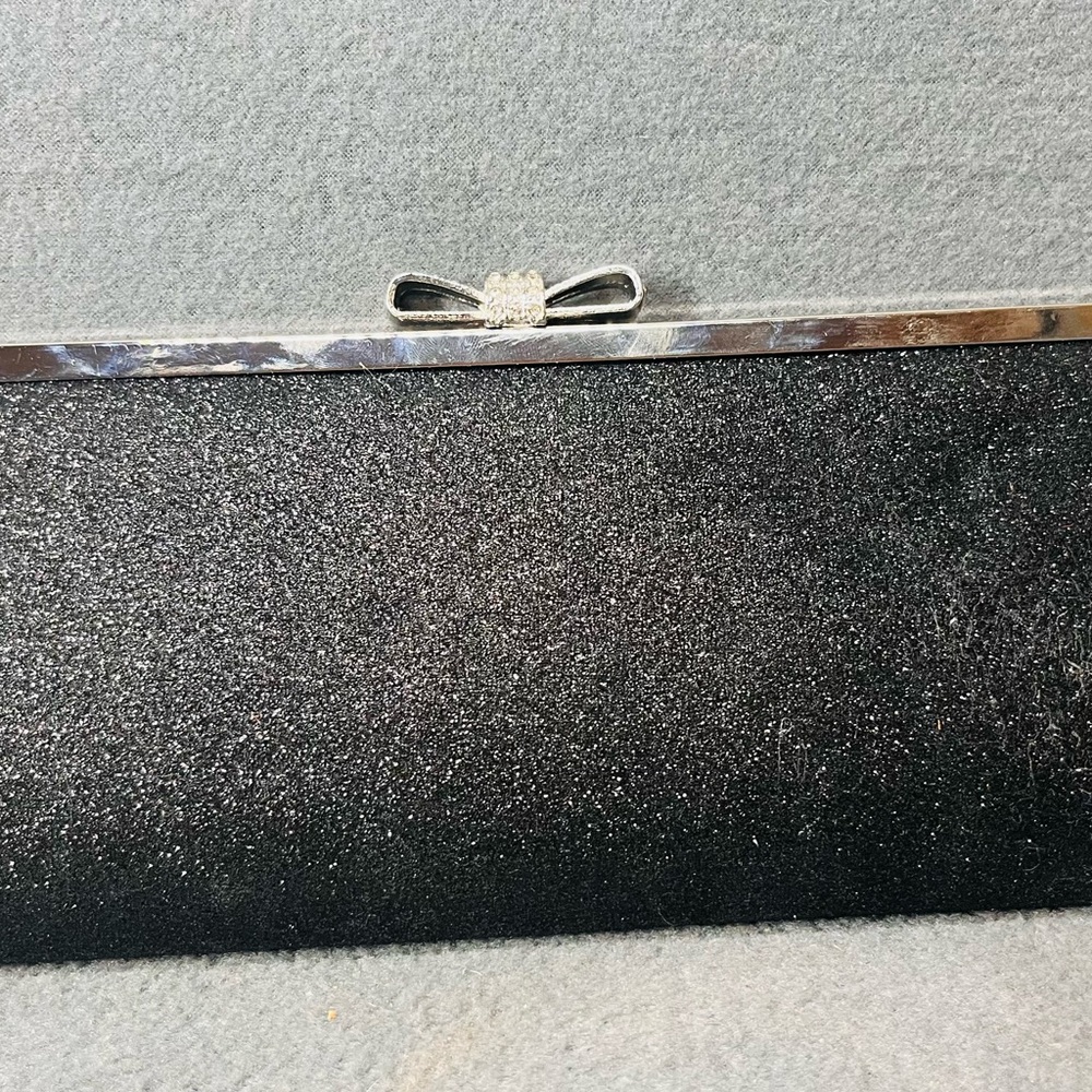 INC International Concepts Black Glitter & Silver Bow Clutch‎